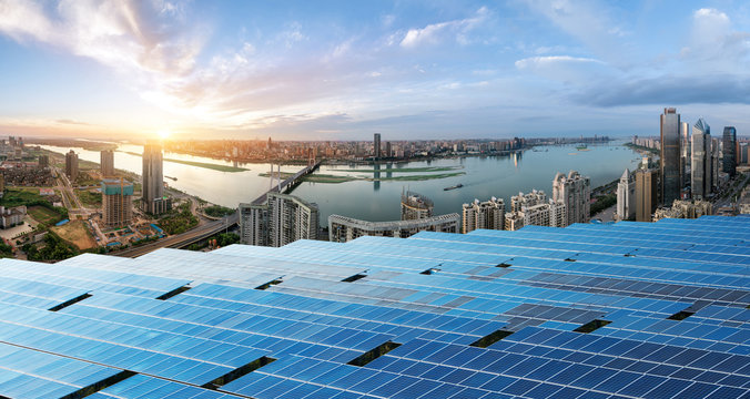 Eco-environmentally friendly green energy of sustainable development of solar power plant with Shanghai skyline