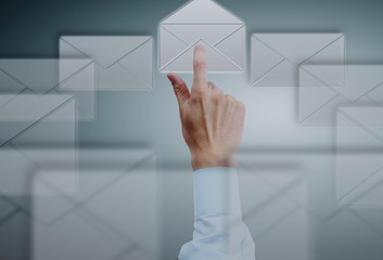 Businessman choosing  e-mail icons