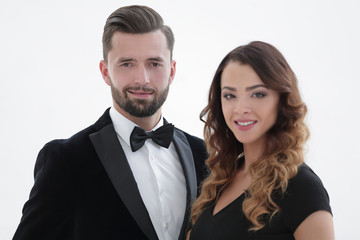 Portrait of a handsome man looking at the camera with a woman