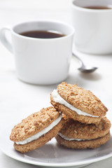 Cookies and coffee cups.