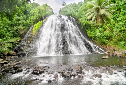 Fototapeta Kepirohi Waterfall located in Madolenihm Municipality, Pohnpei, Micronesia.   