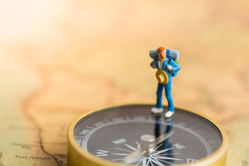 Miniature people : Traveler stand on the compass to tell the direction of travel. Use as a business...