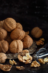 Fresh walnuts on an old wooden table