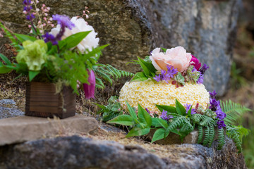 Nature Styled Wedding Cake on River Rock