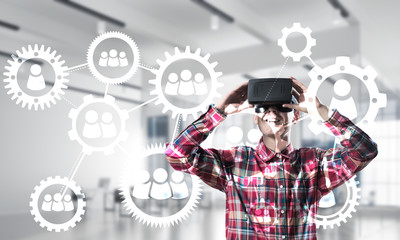 Guy wearing checked shirt and virtual mask demonstrating some emotions