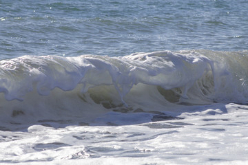 small wave on the beach