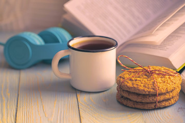 Winter holidays concept. Bookreading and music