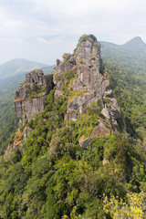 Fototapeta na wymiar Vertical panoramic view from one mountain to another mountain in Hot Springs National Forest Park in Hainan Qixianling