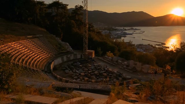 Cinematic shot of the Ancient Theater in Limenas Thassos, Greece in the North Aegean Sea. Thasos is the northernmost Greek island, and 12th largest one.