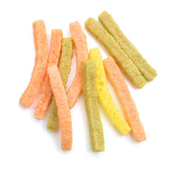 Naturally Baked Veggie Straws Made From Tomatoes, Spinach and Potatoes on white background 