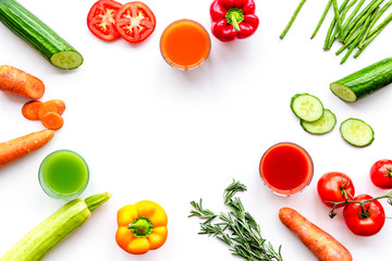 Wellness elements. Colorful detox drinks with vegetables  on white background top view copyspace
