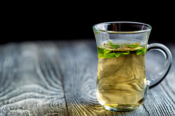 Herbal tea with honey and mint leaves