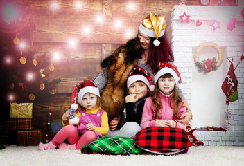 big family and a dog on a fluffy carpet in anticipation of Christmas