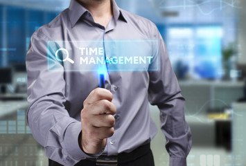 The concept of business, technology, the Internet and the network. A young entrepreneur working on a virtual screen of the future and sees the inscription: Time management