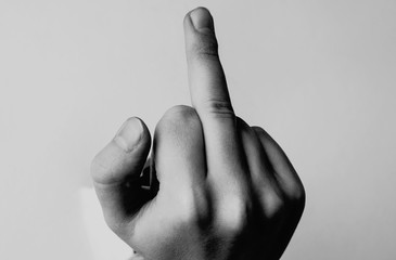 Hand gesture. Middle finger sign as symbol of fury and aggression.