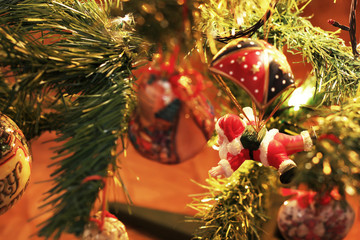 Fototapeta na wymiar New Year's toys on the Christmas tree. Christmas. New Year. Celebration. Card