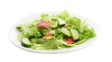 Plate with delicious vegetable salad on white background