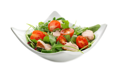 Bowl with delicious vegetable salad on white background