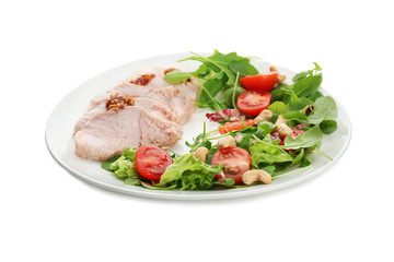 Plate with meat and delicious vegetable salad on white background