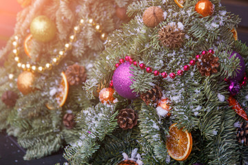 Obraz na płótnie Canvas Christmas tree with beautiful ornament closeup, festive background