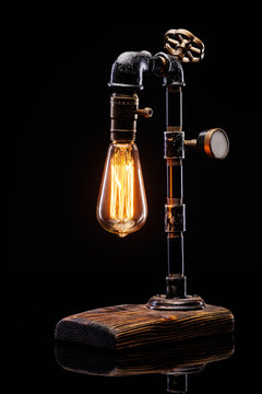 Design retro lamp made in the form of a water pipe.