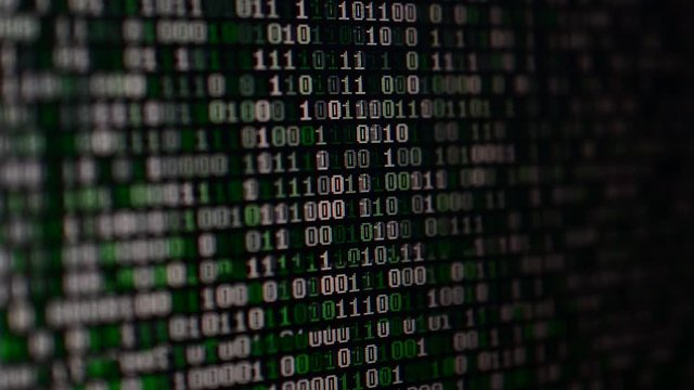 Binary code on the monitor screen.