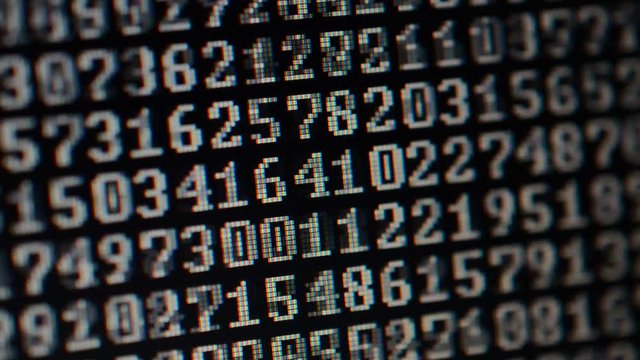 Binary code on the monitor screen.