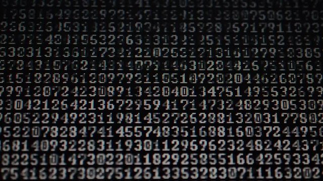 Binary code on the monitor screen.