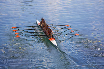 Team of rowing Four-oar women in boat - 185288480