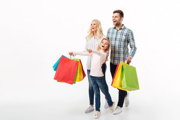 Full length portrait of a cheerful family