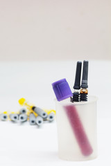 Test tube and syringes