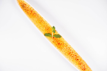 Crème brûlée on a white background