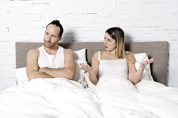 Couple conflict on bed. Couple mistake