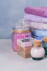 Obraz na płótnie Canvas Natural cosmetic oil, cream, sea salt and natural handmade soap with lavender