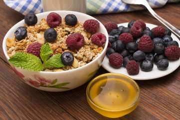 Breakfast served with orange juice, croissants, cereals and fruits. Balanced diet.