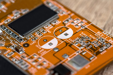 orange motherboard close up