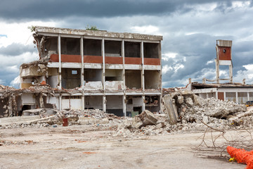 Demolition building after earthquakes or war. Deconstruction concept.