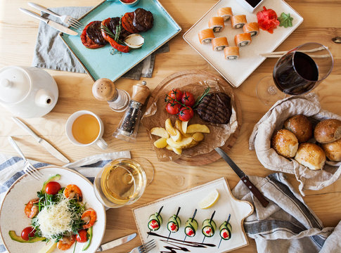 Beautifully decorated dining table with various dishes and drinks