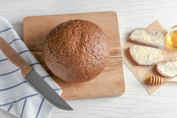 Freshly baked buckwheat bread on wooden board