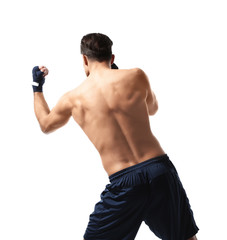 Attractive young boxer on white background