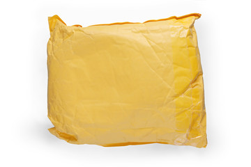 Yellow postal cardboard package isolated