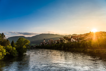Fototapeta na wymiar Frohnleiten Austria Golden Hour Village at river mur