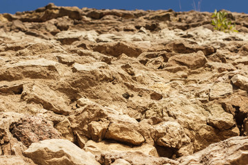 The wall of the bridge from the old destroyed masonry