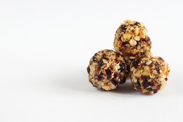 Handmade vegan balls made from coconut, cranberries and nuts.