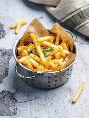 French fries on wooden table