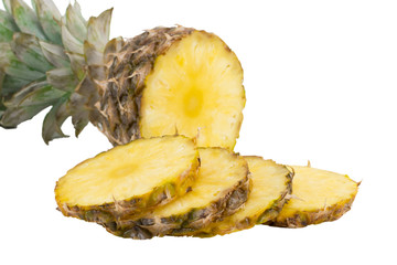 pineapple fruit with slices isolated on white background