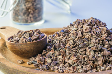 Cocoa beans and cacao powder - closeup with detail macro shot