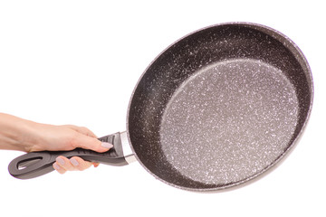 Frying pan with non-stick marble coating female hand