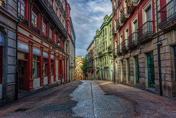 Empty street with colorful old buildings during early morning un
