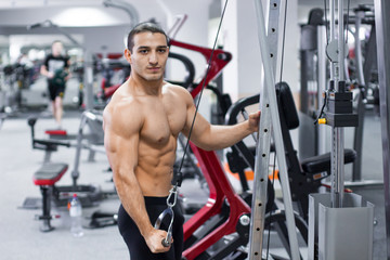 Naklejka na ściany i meble sport man men training in gym